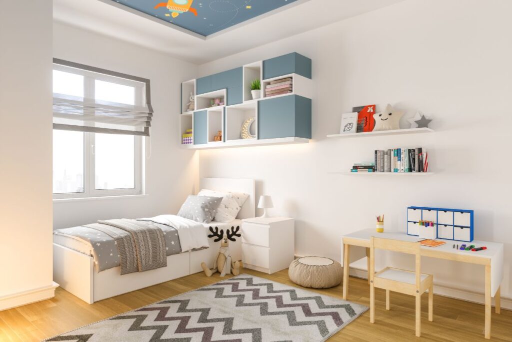 Modern kids bedroom with natural lighting and study area featured in a San Diego home by a real estate agent.