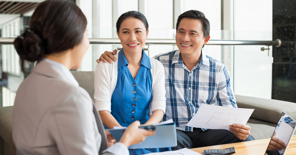 Real estate agent evaluating property condition with clients to make an informed decision about the home purchase.